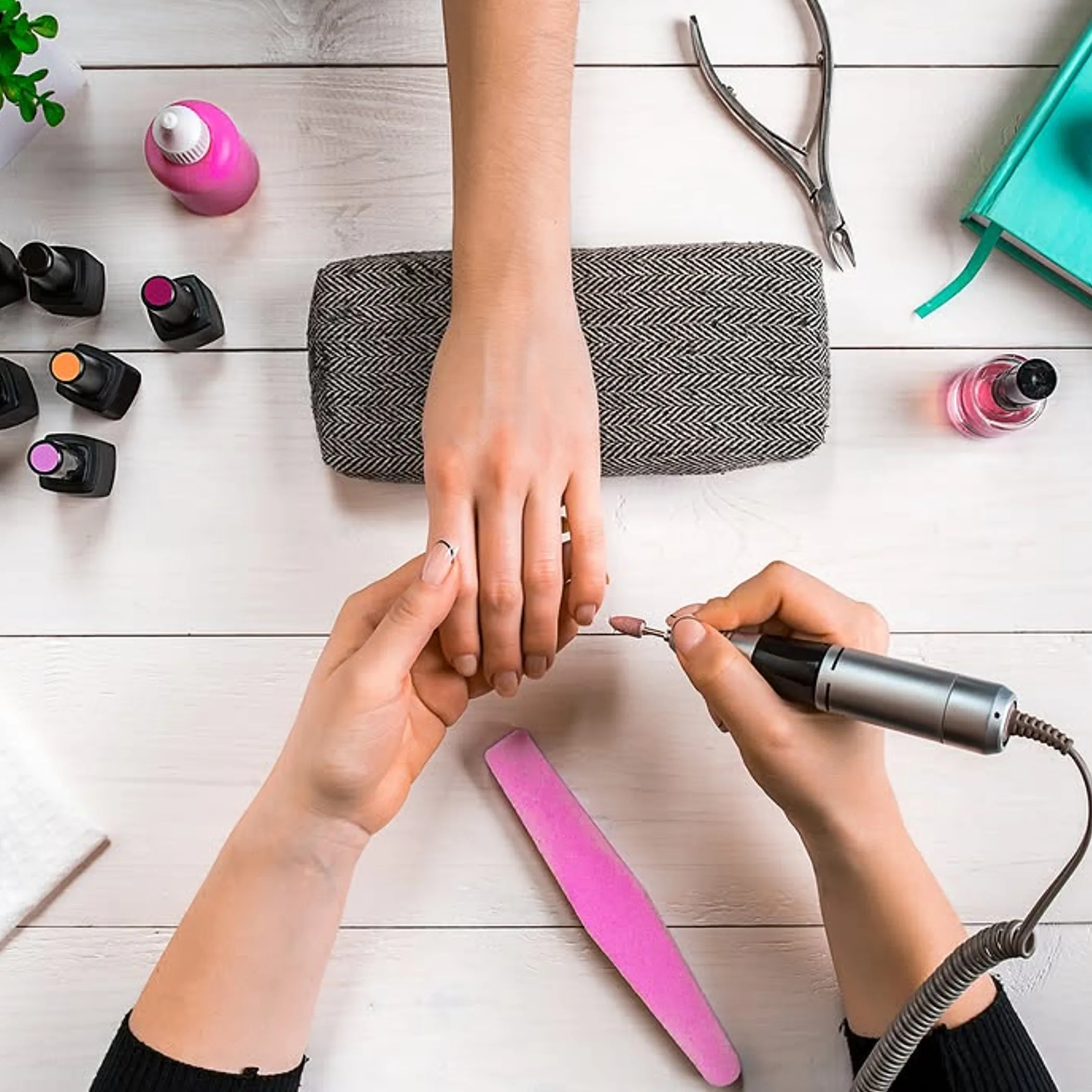 nail technician disposing used gloves safely